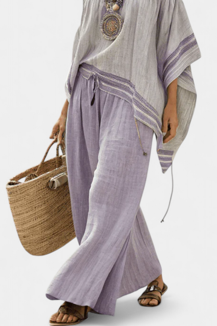 Serenella - blusa de hombros caídos y pantalones de pierna ancha a rayas