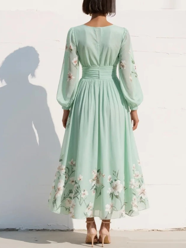 Vestido midi verde claro de gasa con escote en V y flores